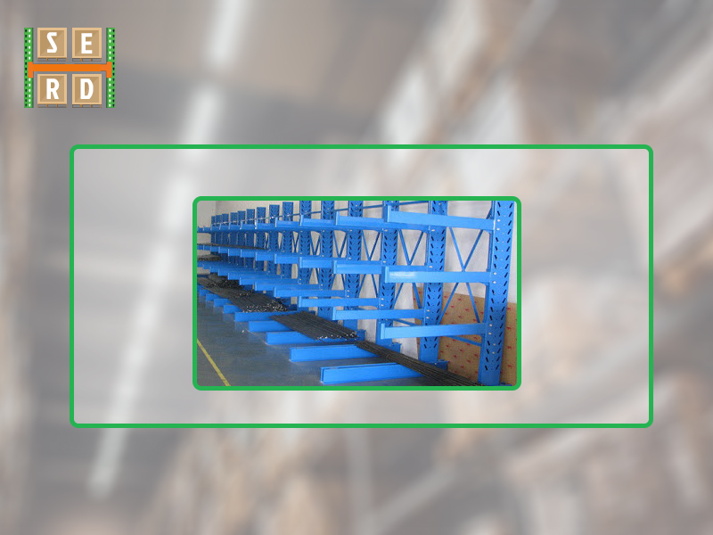 orange-and-green-colored-beam-with-blue-and-orange-colored-pallet-rack-in-background