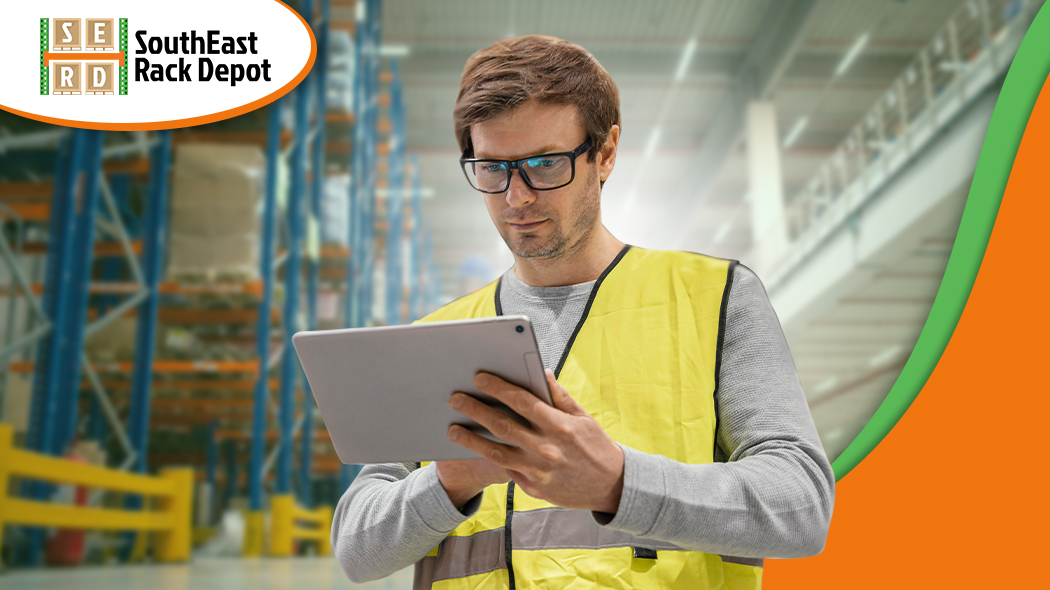 man-inspecting-on-warehouse-operation-over-an-ipad