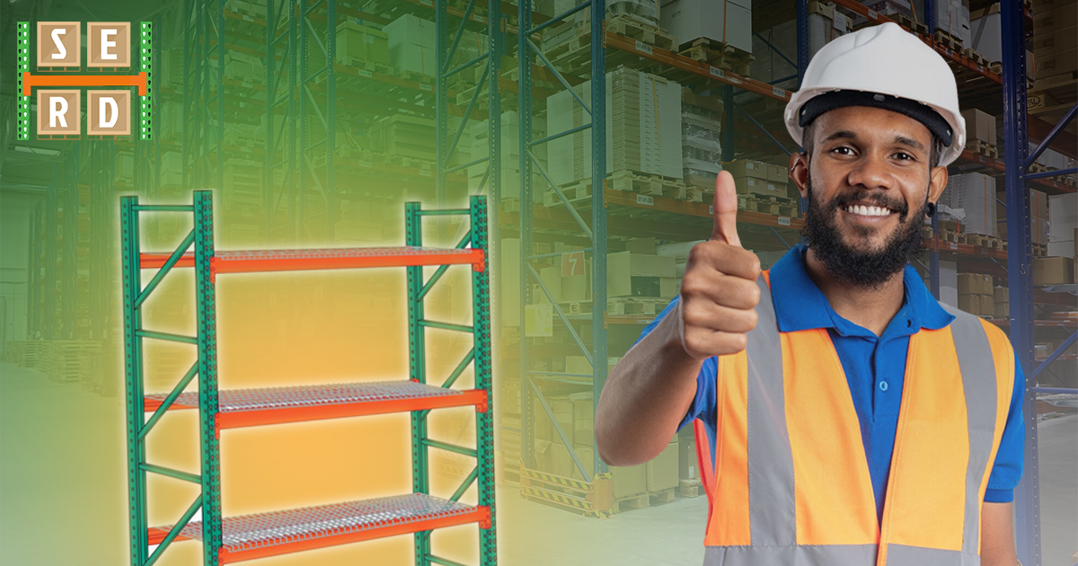 heavy-duty-industrial-pallet-racking-worker-smiling-showing-thumbs-up-and-interior-of-a-warehouse