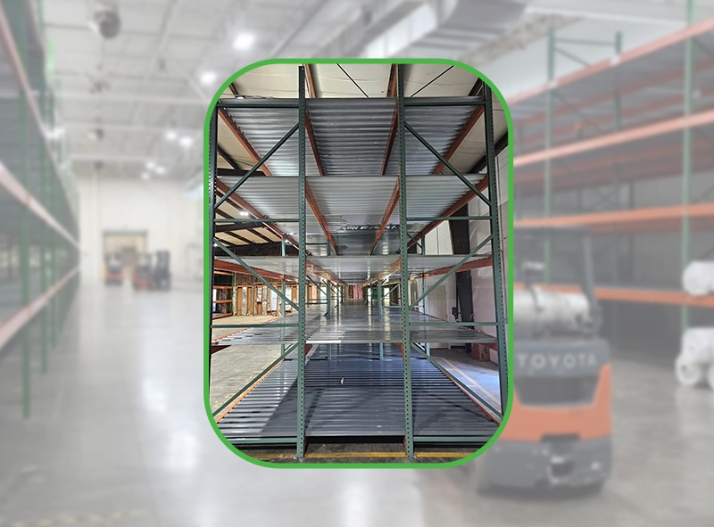 Industrial carpet storage racks inside a warehouse, showcasing heavy-duty steel shelving designed for organizing and storing large carpet rolls.